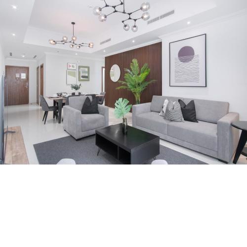 Luxe Apartments near Dubai Mall, Burj Khalifa - Pool, Gym, & Parking by Sojo Stay