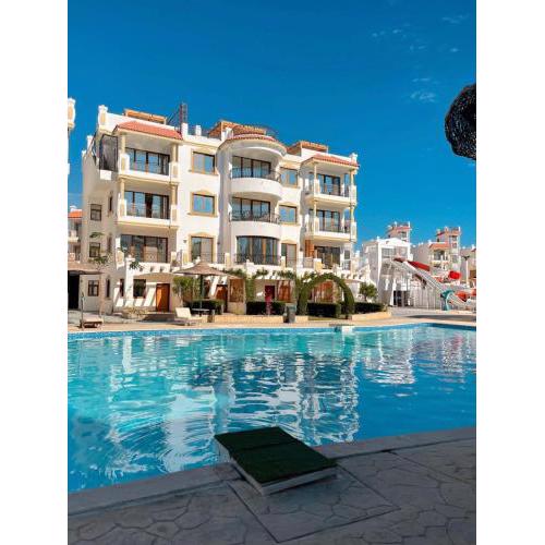 Luxury 1 bedroom apartment with pool view ,Private Garden - Sharm Hills resort - Montaza - Sharm El Skeihk