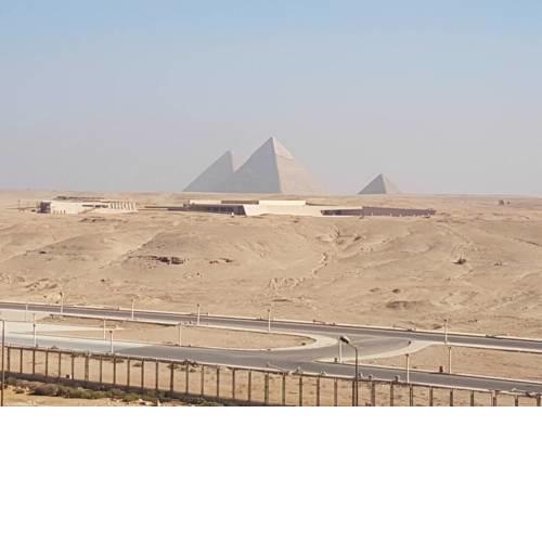 Luxury Pyramids Inn + Tours and Transportations