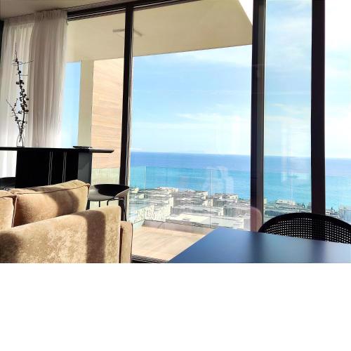 Luxury sea view apartment with private beach just a few steps from the center