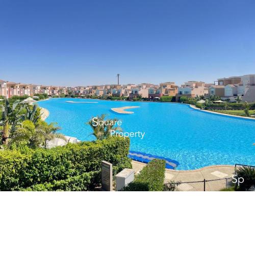 Marassi Luxurious 2 bedrooms Lagoon -Steps to the Beach ,El Alamein hotel& Marina