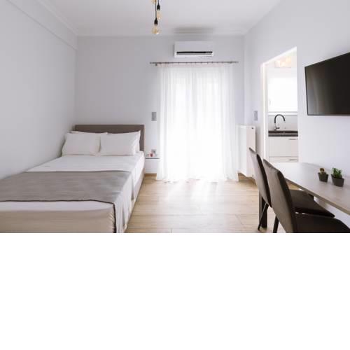 Minimal apartment on the shadow of the Acropolis