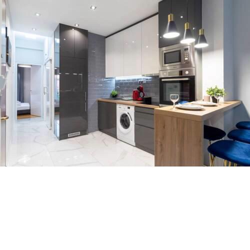 Modern and luxury 5th floor apt in Kallimarmaro
