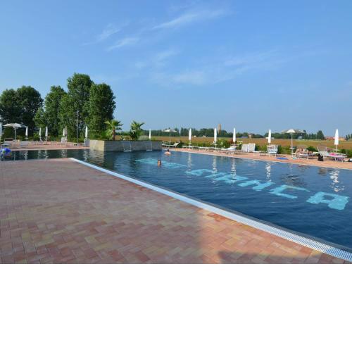 Modern apartment in Codigoro with a pool and wellness centre