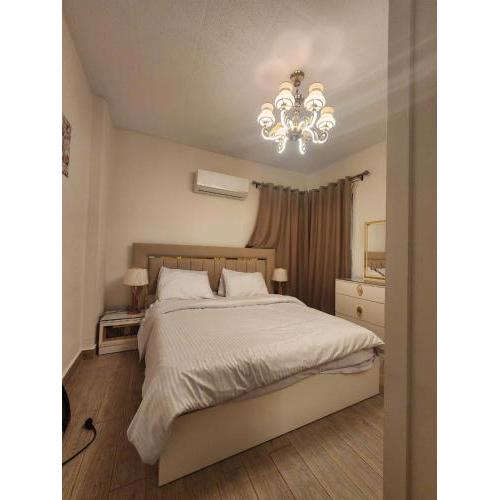 Modern Garden-View Apartment in Prime Al Rehab Location