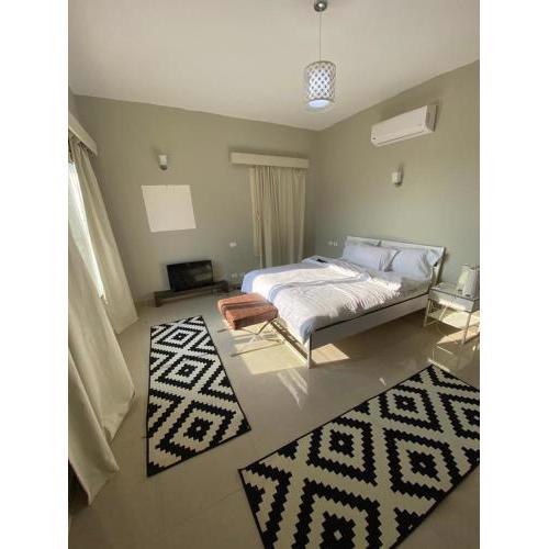 Modern Serviced Apartment at The Village, New Cairo