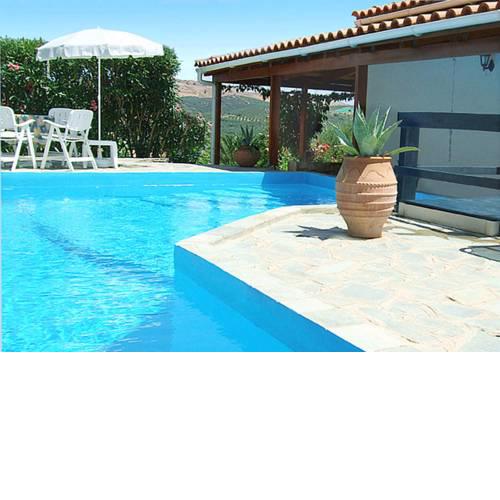 Modern villa with private pool near the beach surrounded by olive groves