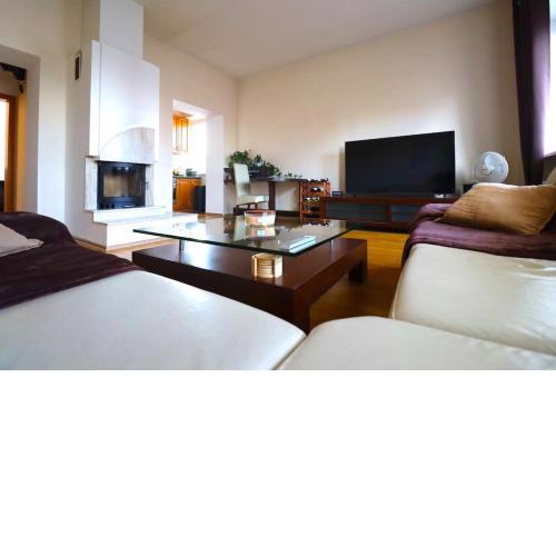 Moderný apartmán s krbom