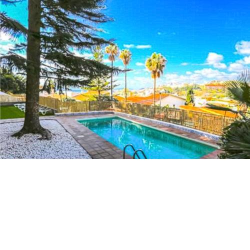 Nice home in Málaga with Outdoor swimming pool, WiFi and 6 Bedrooms