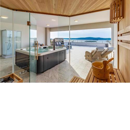 Nice home in Pomer with Outdoor swimming pool, Sauna and 4 Bedrooms