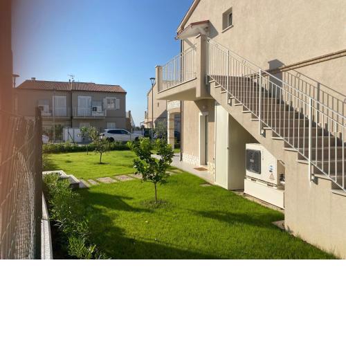Nuovo trilocale con giardino, aria condizionata
