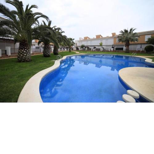 PALM BEACH 132 Adosado con jardin y piscina ALBERT VILLAS
