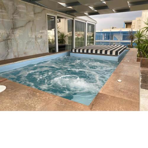 Penthouse with mini Private Pool with Hydromassage and Great Town View