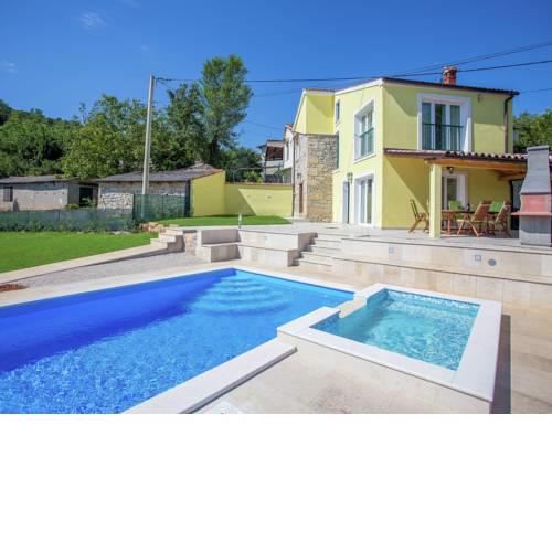 Picturesque Villa with Pool and Kids' Pool in Karojba