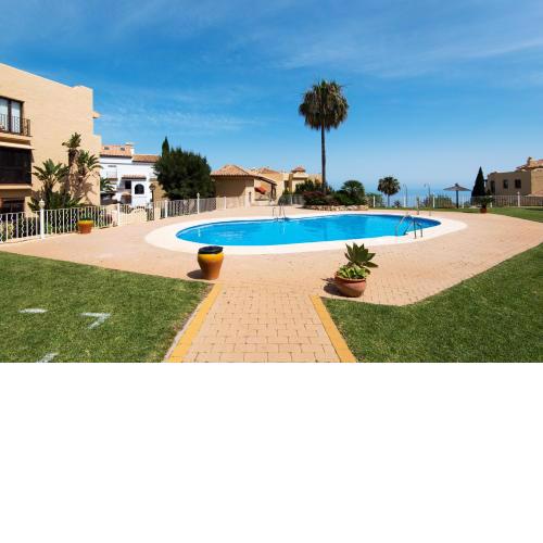 Piso Benalmádena Pueblo con vista, piscina y tranquilidad