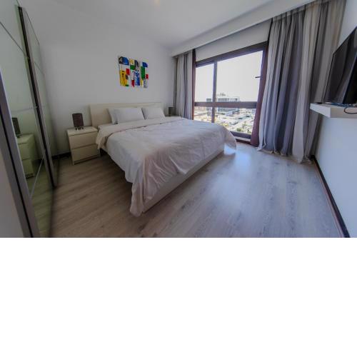 Porto New Cairo - Nyoum compound Modern 2-Bedroom, Prime Location