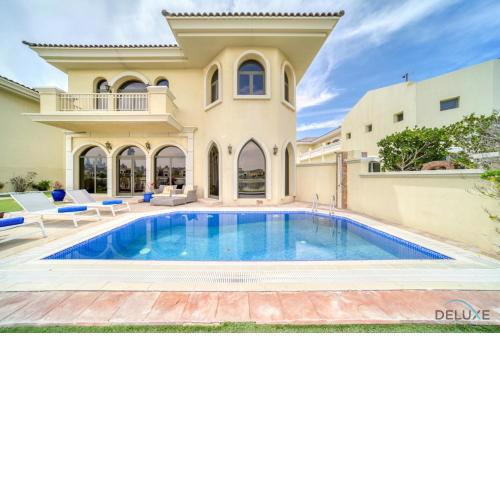 Premier 6BR Villa with Assistant's Room and Private Pool in Frond E Palm Jumeirah by Deluxe Holiday Homes