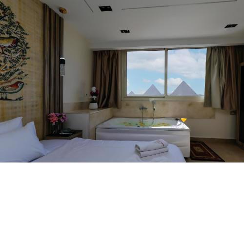 Pyramids View& Grand Museum With Jacuzzi On Eleven Floor & Roof Restaurant