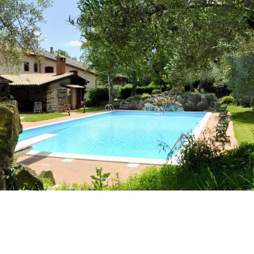 Quiet rustic farmhouse, surrounded by greenery, swimming pool with tennis court