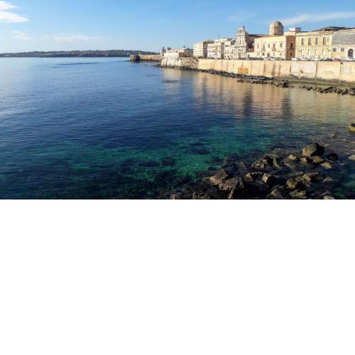 Raffinato appartamento in palazzo antico centro storico Ortigia