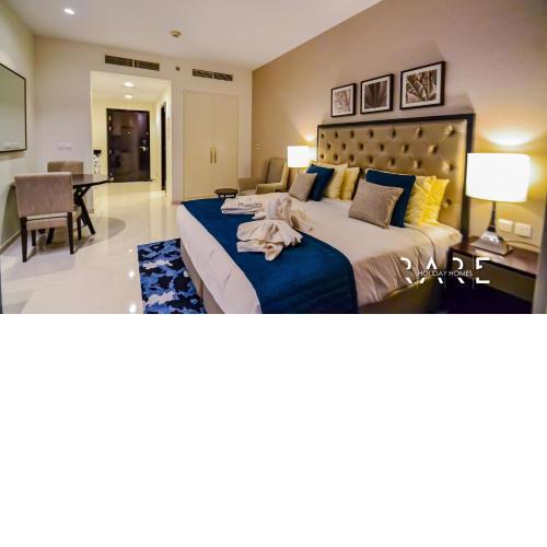 Rare Holiday Homes offers Pool View Studio Apartment in Celestia Tower Dubai South R724