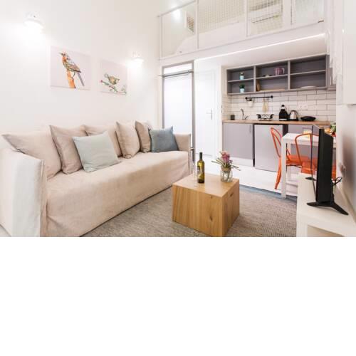 Relax in this funky loft next to metro!
