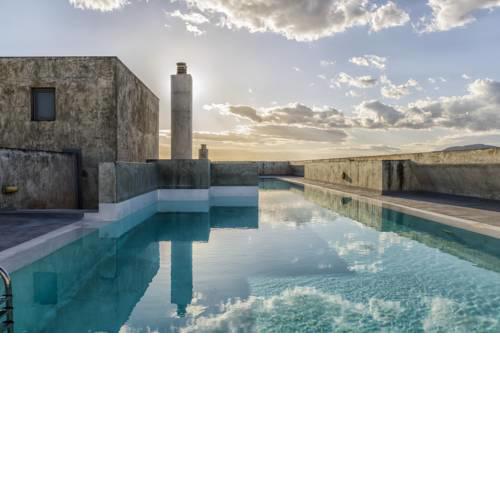 Relaxing by the pool gazing the Acropolis