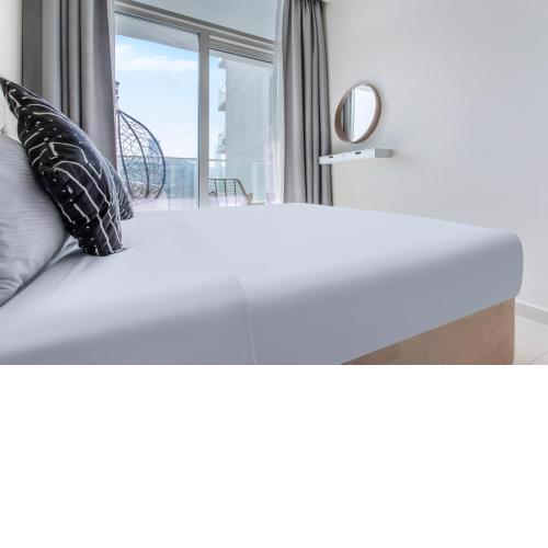 Reva Residences - One Bedroom Apartment by the S Holiday Homes