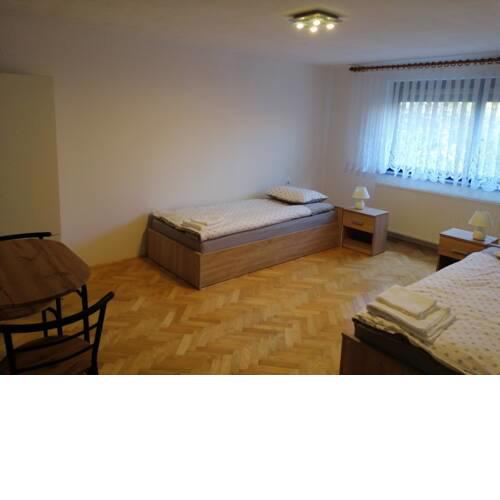 Rooms and apartments Alpinia