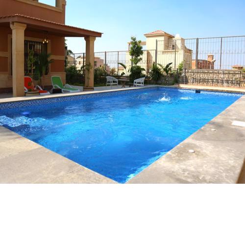Royal Mansion with private pool in sheikh zayed Compound families