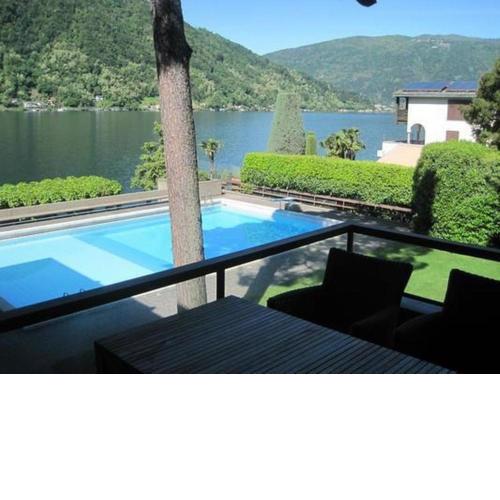 Schönes, exklusives Apartment, direkt am Luganersee, modernes Interieur, Außenpool