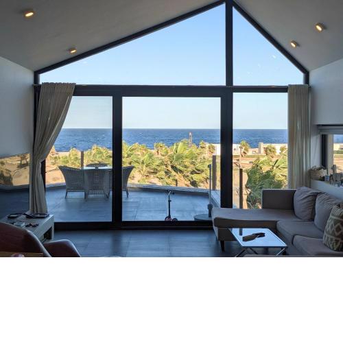 Sea & Golf Views 2BR Villa with Free Beach & Pool Access