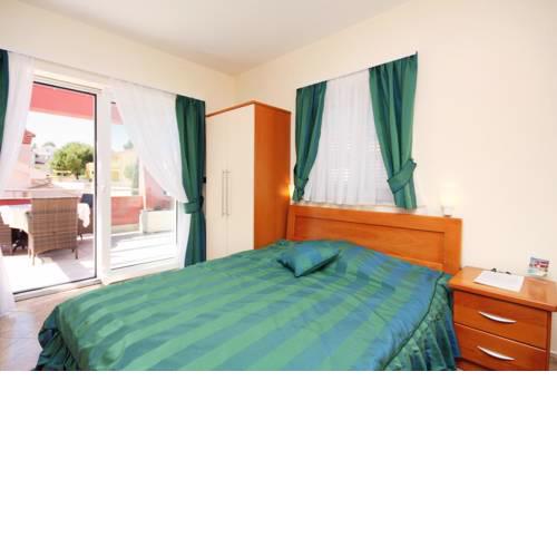 Seaside apartments with a swimming pool Barbat (Rab) - 4980