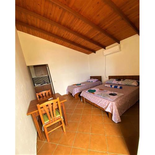 Second Room of Panoramic Perch - Hilltop Room with Kitchenette and Patio