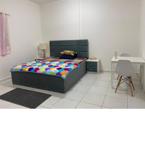 Sharjah Homestay not hotel Master Bedroom with attached private washroom in furnished 2 BHK flat
