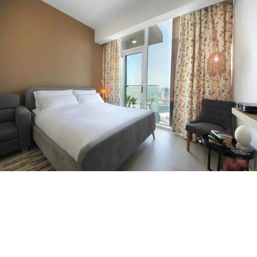 Signature Holiday Homes - Stunning Furnished Studio Apartment in JVC