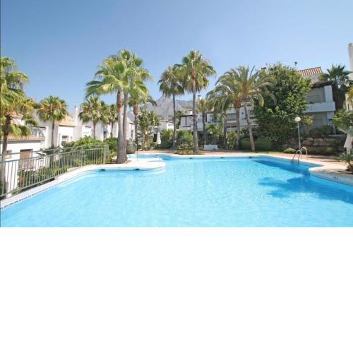 South faced 4 bdrm townhouse with pool in Marbella