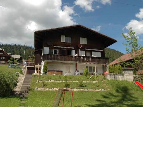 Spacious Chalet in Eriz with Riverside Garden
