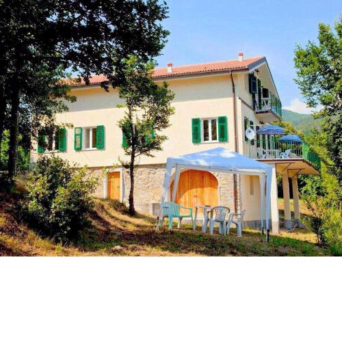 Spacious home divided in two apartments with lovely terrace surrounded by nature