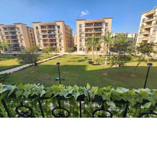 Spacious Modern Apartment with Wide Garden View in Al Rehab 2