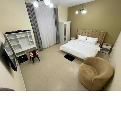 Spacious Sharing Room with shared Bathroom & shared Kitchen Inside 3BK Flat for rent at Ajman-00309L