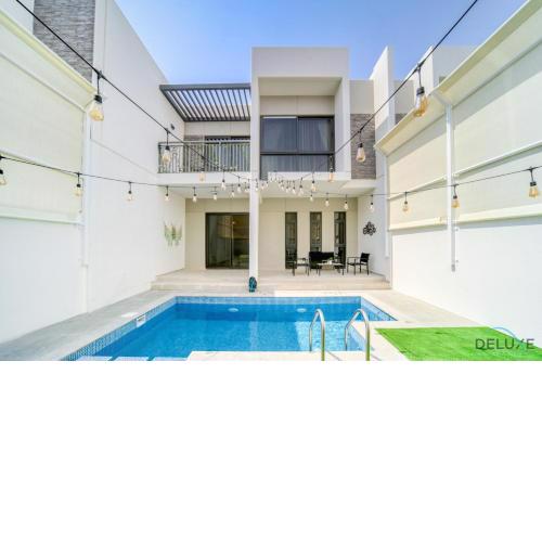 Spectacular 3BR Townhouse with Assistant Room and Private Pool at DAMAC Hills 2 Dubailand by Deluxe Holiday Homes