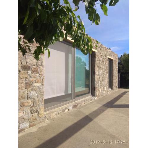 Stone built house next to the beach