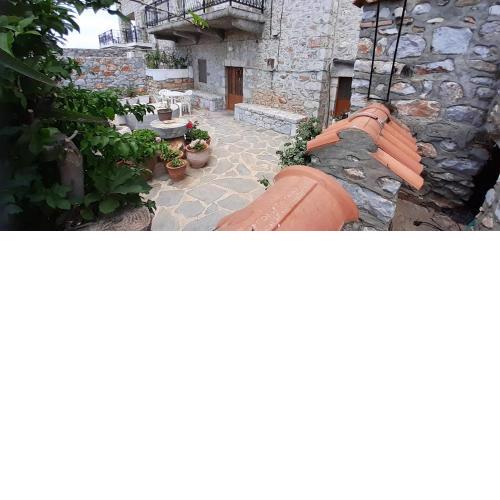 Stone house with a beautiful yard