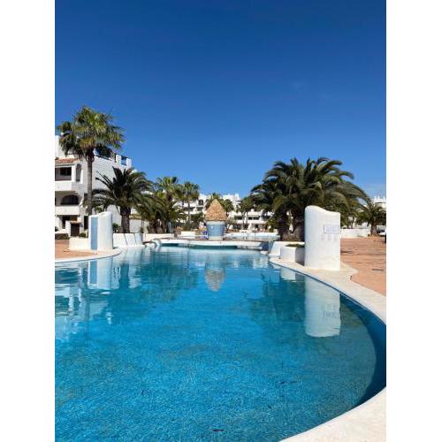 Stunning apartment with private garden overlooking pools Marina D'Or II, Cala Egos