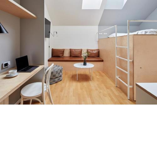 Sunlit Studio near Wenceslas Square by Prague Days