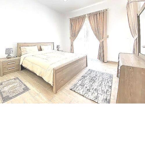 Super OYO 928 Home 436 Binghatti Mirage - 1BR, JVC