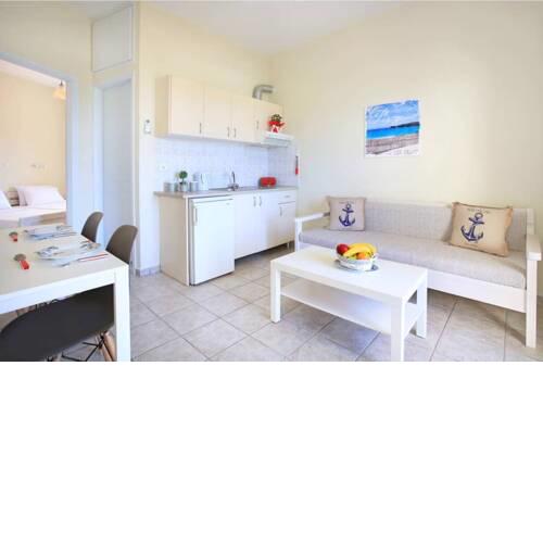 Swim, sunbathe, relax in beach front apt Daphne