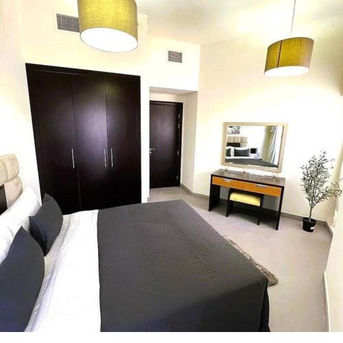 The Bridge at Dubai Sports City by Letstay - a cozy 1 bedroom apartment with pool.