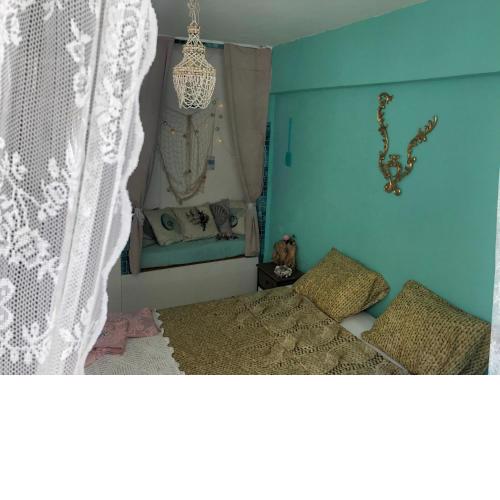 The turquoise house in center of Agios Nikolaos